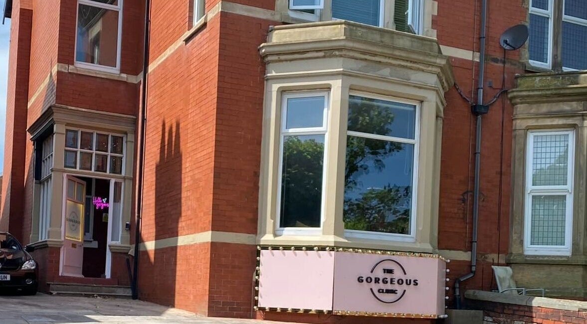 Exterior view of The Gorgeous Clinic in Blackpool, England, showcasing the inviting front entrance.