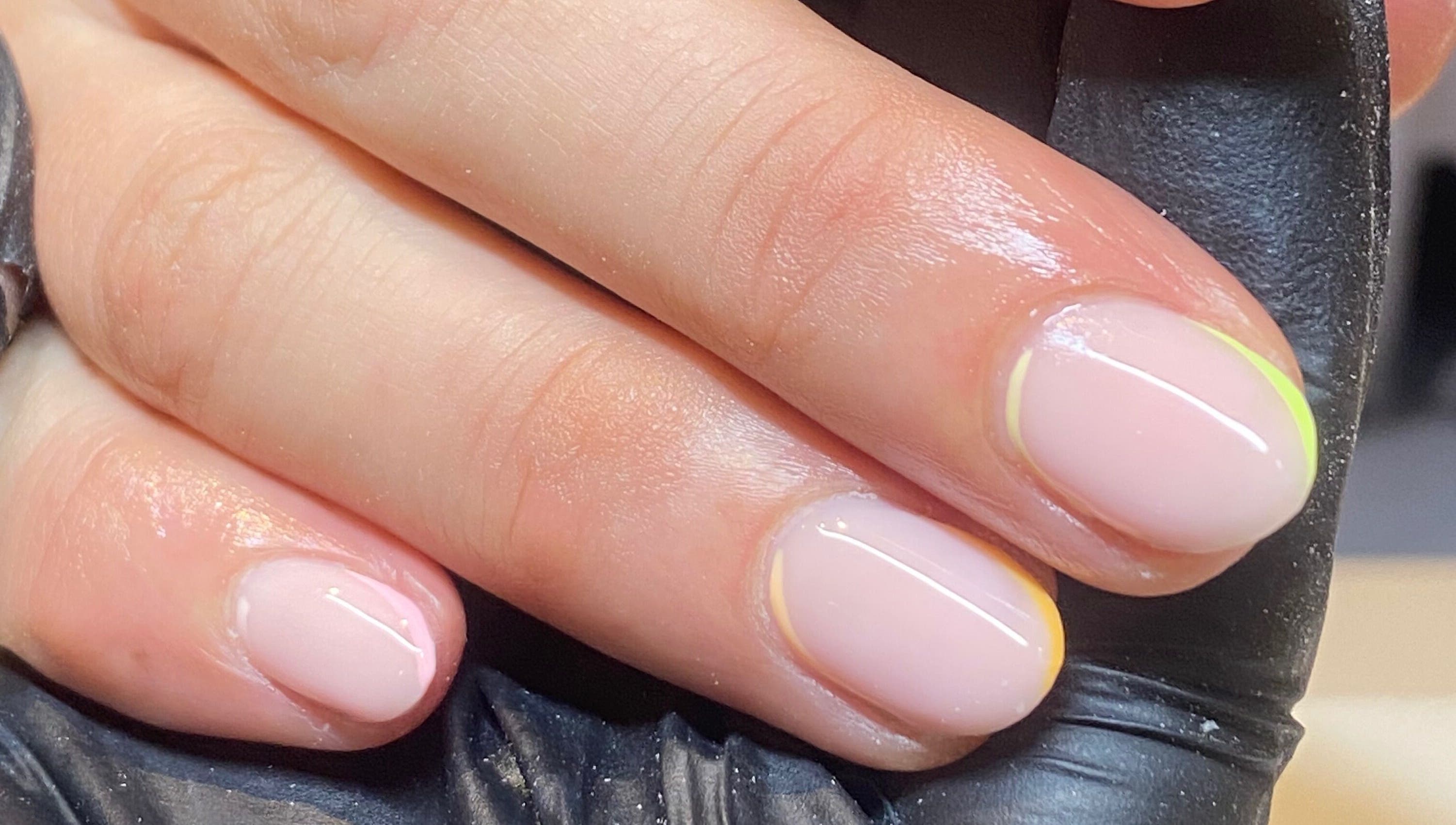 Elegant manicure at Bealer Beauty, Basingstoke, England, GB showcasing glossy pastel nails.