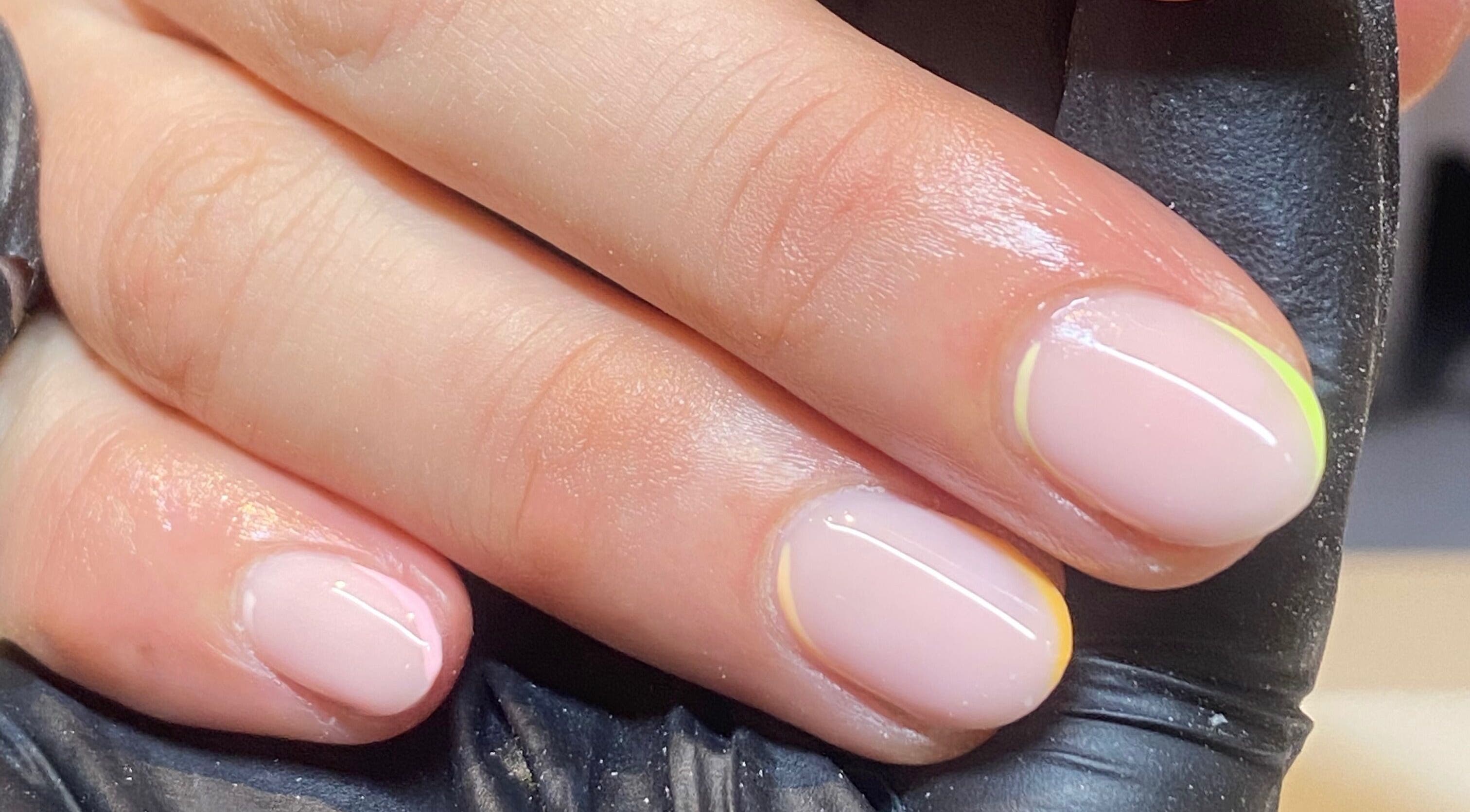 Elegant manicure at Bealer Beauty, Basingstoke, England, GB showcasing glossy pastel nails.