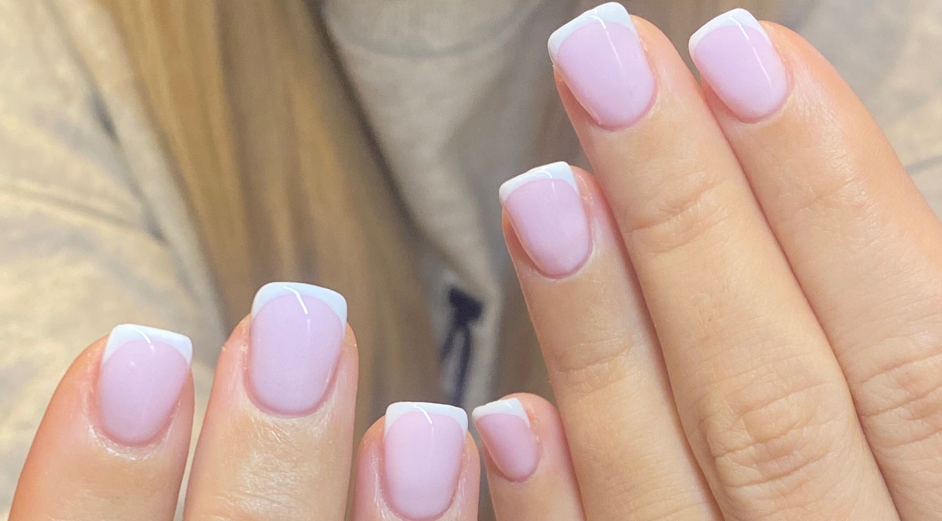 Elegant French manicure at Bealer Beauty, Basingstoke, England, GB. Perfectly styled light pink nails.