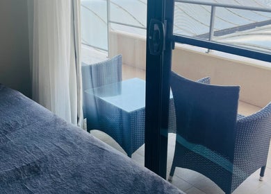 Relaxing massage bed with a balcony view at Mandurah Mobile Massage Therapy, Mandurah, Western Australia, AU.