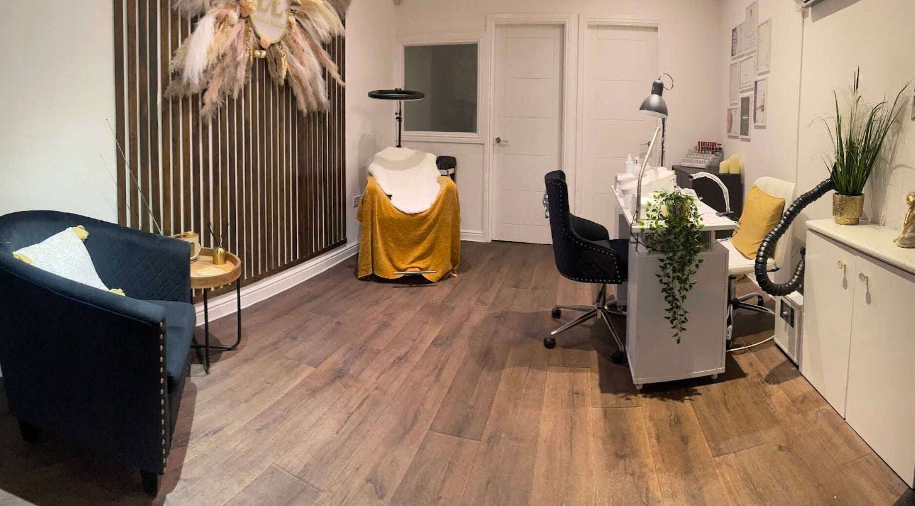 Cozy interior of Lisa Lomas Nails and Beauty, Blackpool, England, GB, with elegant decor and a nail station.