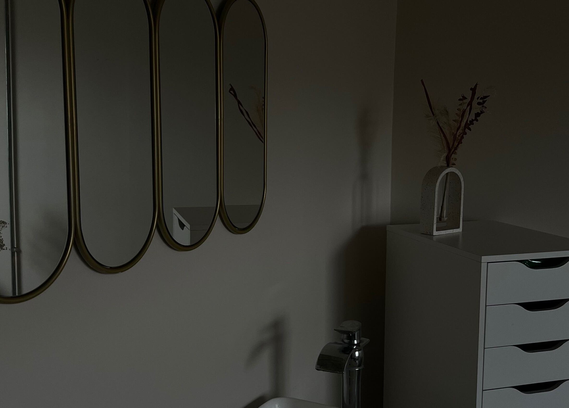 Elegant mirrors and chic decor at LJW Brows, Stoke-on-Trent, England, GB showcasing a serene ambiance.