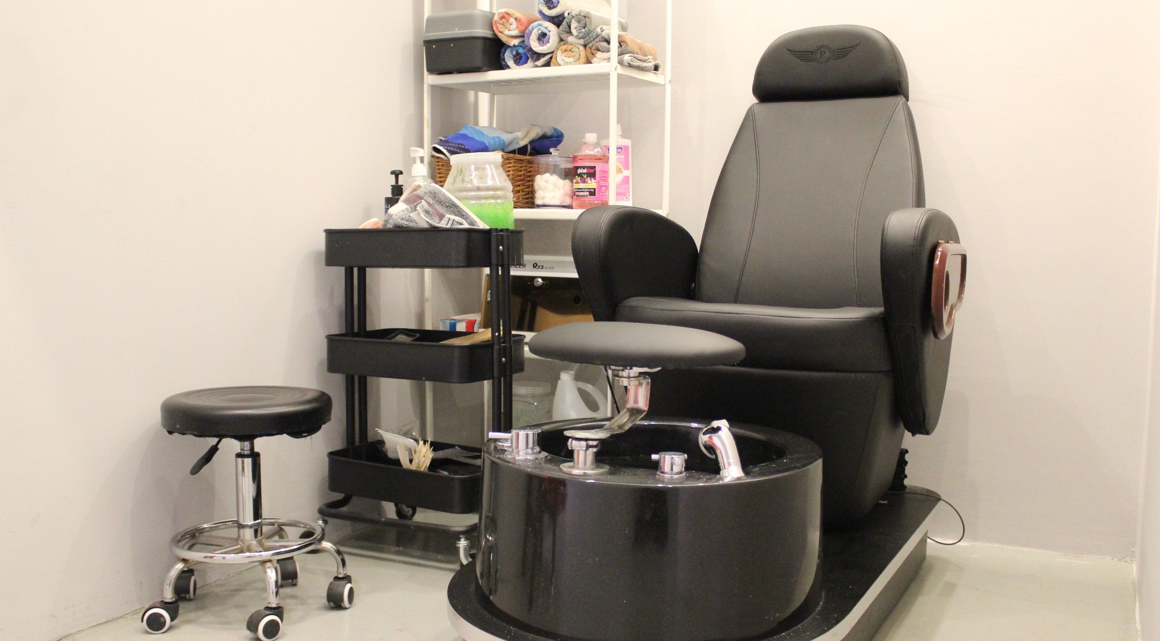 Luxurious spa chair setup at Evoke Gents Saloon, Dubai, AE for a premium pedicure experience.