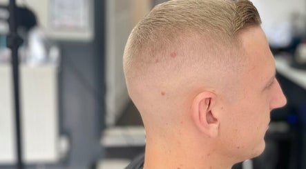 Close-up of a clean fade haircut at Allens Barbers & Co, Southampton, England, GB.
