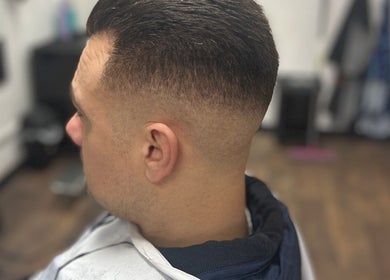 Close-up of a sleek fade haircut at Allens Barbers & Co, Southampton, England, GB.