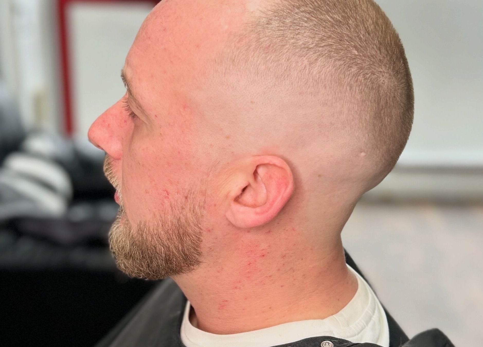 Side view of a fresh buzz cut at Allens Barbers & Co, Southampton, England, GB.