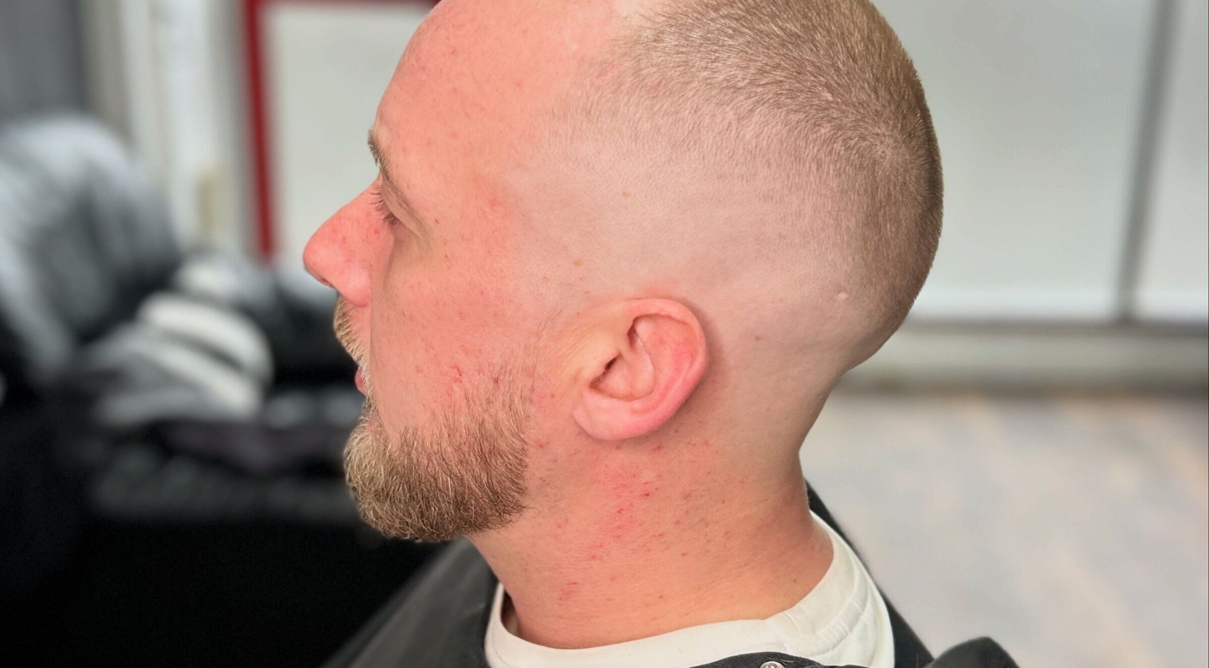 Side view of a fresh buzz cut at Allens Barbers & Co, Southampton, England, GB.
