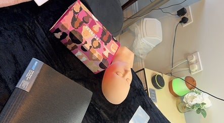 Beauty setup at Pretty By Hannah Giles, Banbury, England, GB with mannequin and vibrant box.