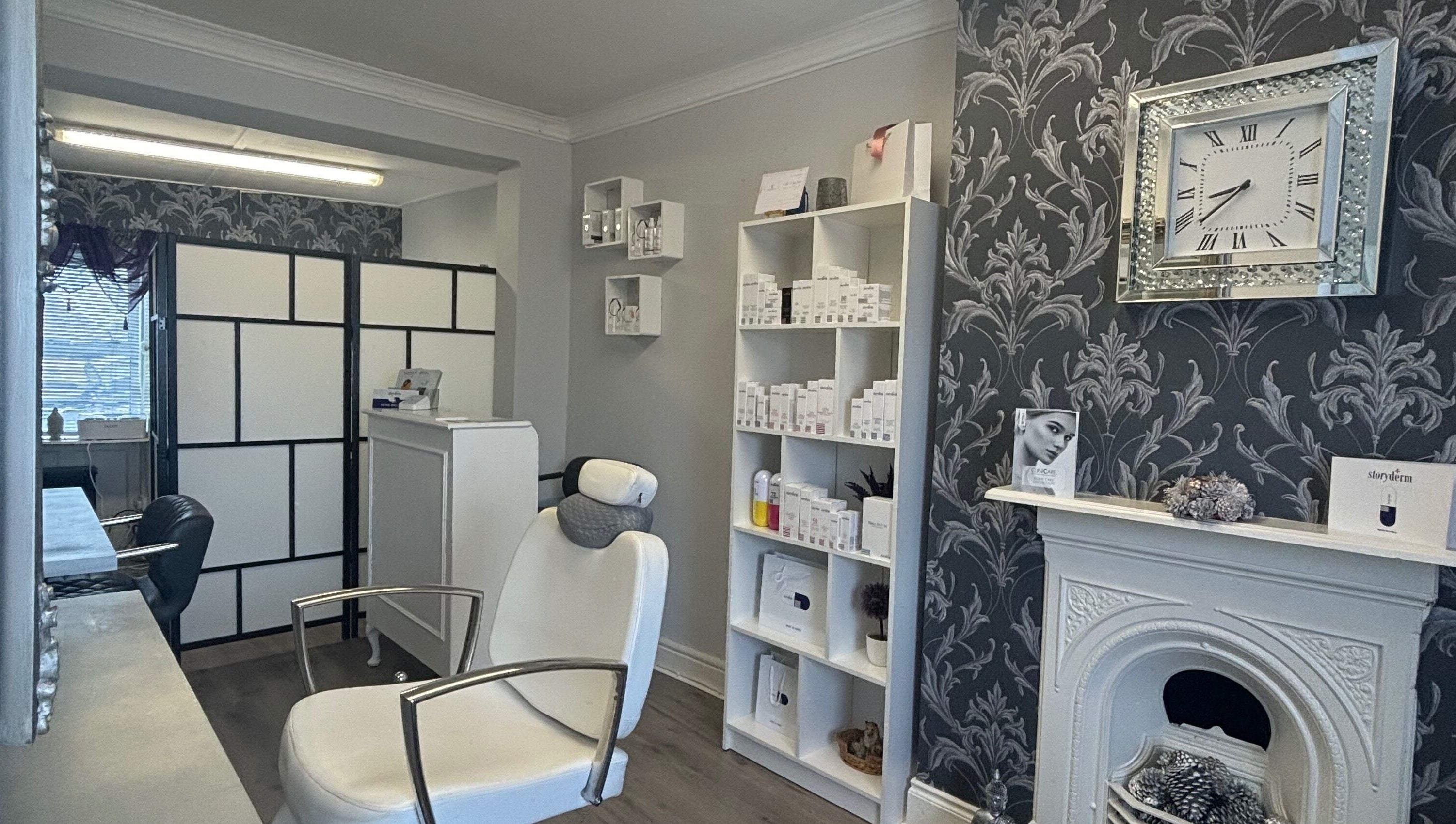 Chic interior of AC Aesthetics and Laser Clinic in Fethard, Tipperary showing treatment chair and decor.