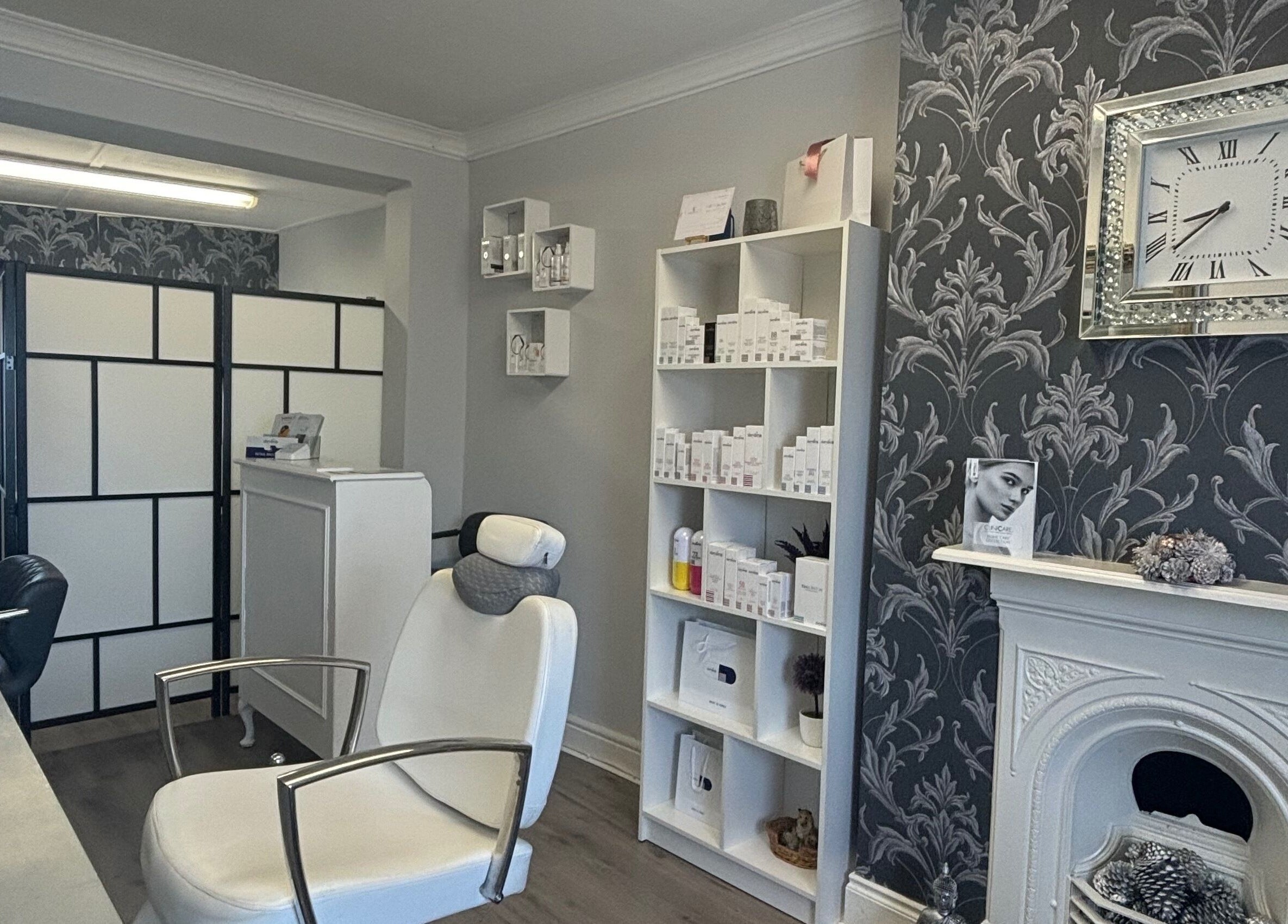 Chic interior of AC Aesthetics and Laser Clinic in Fethard, Tipperary showing treatment chair and decor.