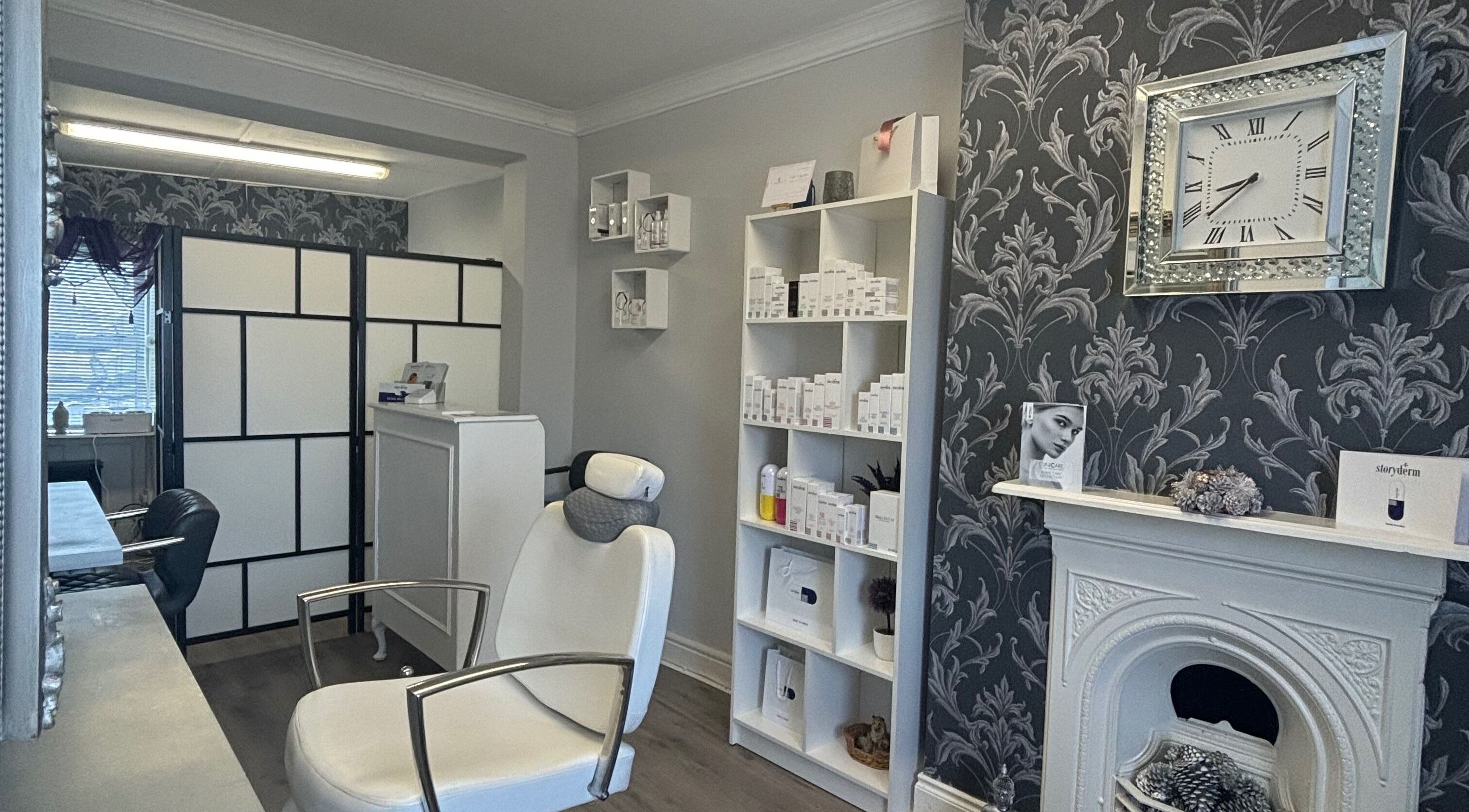 Chic interior of AC Aesthetics and Laser Clinic in Fethard, Tipperary showing treatment chair and decor.