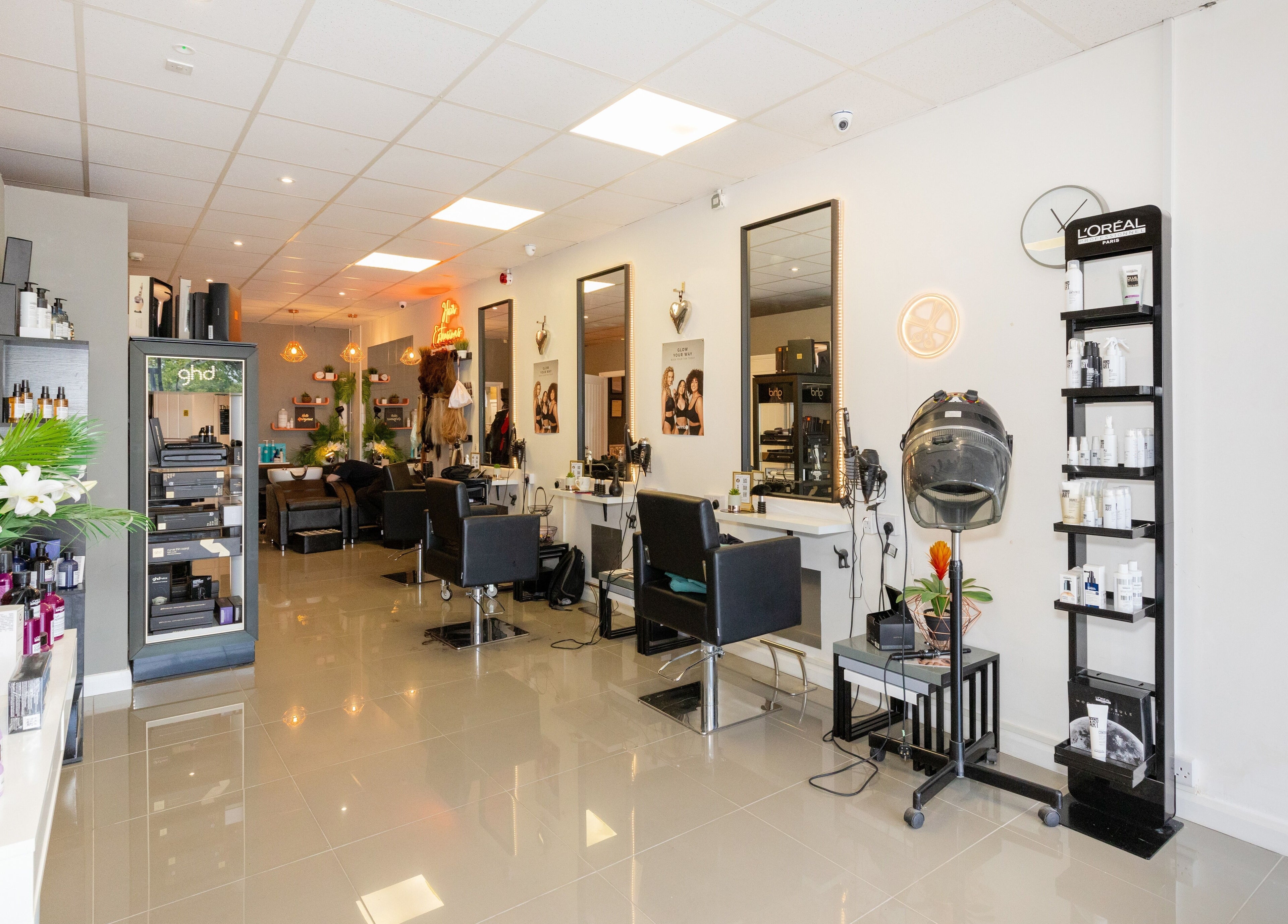 Modern interior of Gorgeous salon in Wolverhampton, England, GB, with stylish seating and beauty products.