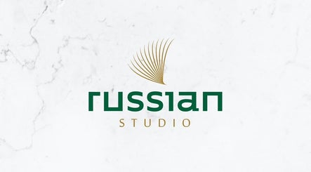 Russian Studio logo on marble backdrop, Giza Governorate, EG.