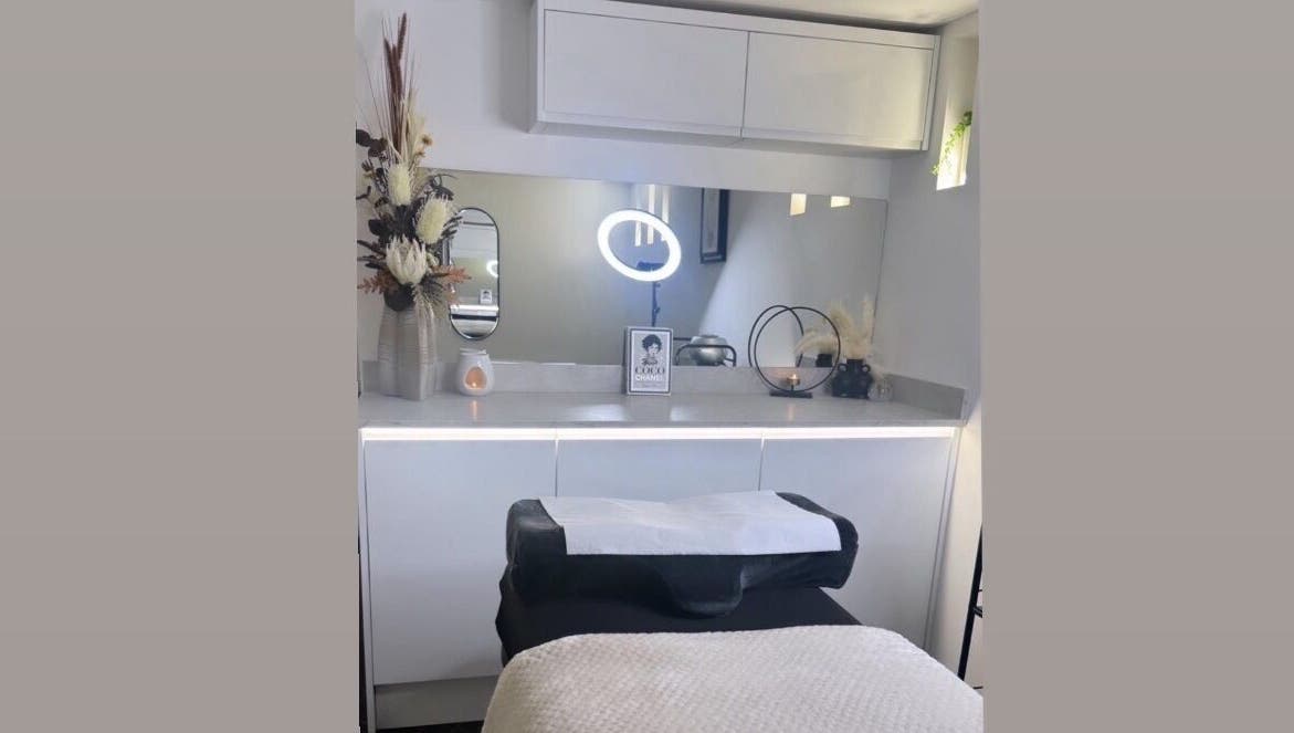 Modern treatment room at GLOW BY COCO, Hindley, England, GB, featuring stylish decor and relaxation ambiance.