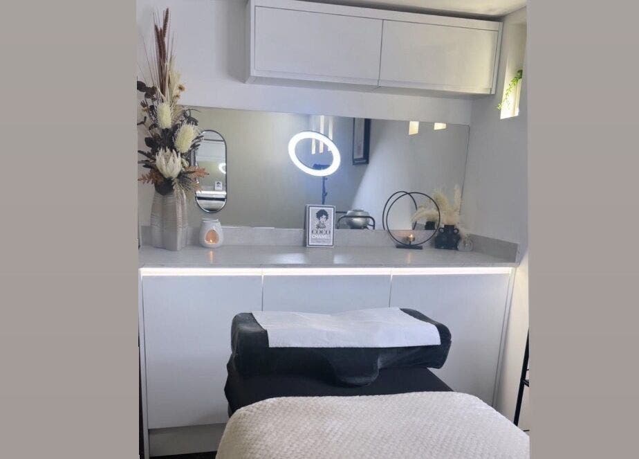 Modern treatment room at GLOW BY COCO, Hindley, England, GB, featuring stylish decor and relaxation ambiance.