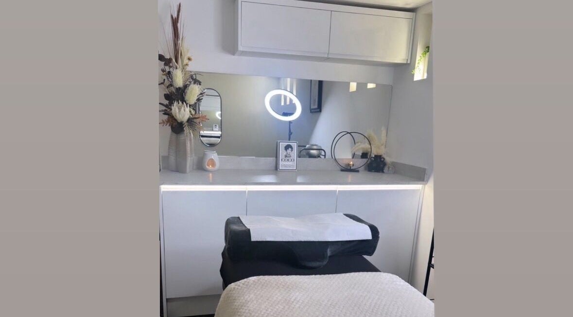 Modern treatment room at GLOW BY COCO, Hindley, England, GB, featuring stylish decor and relaxation ambiance.