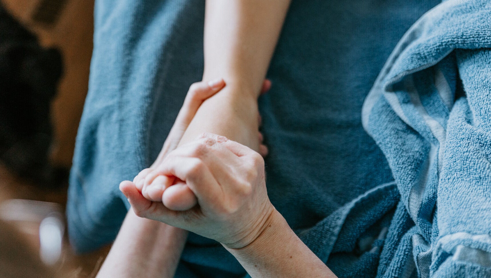 Foot reflexology session at Sole Divine Reflexology+ in Brandon, Manitoba, CA, enhancing relaxation and wellness.
