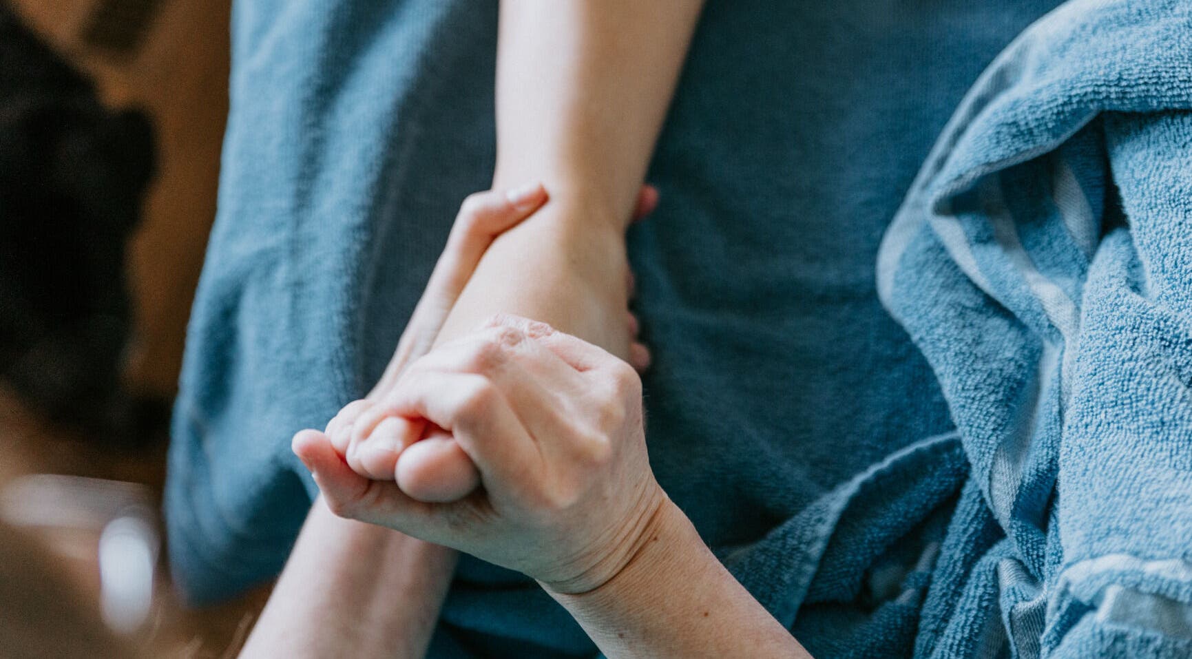 Foot reflexology session at Sole Divine Reflexology+ in Brandon, Manitoba, CA, enhancing relaxation and wellness.