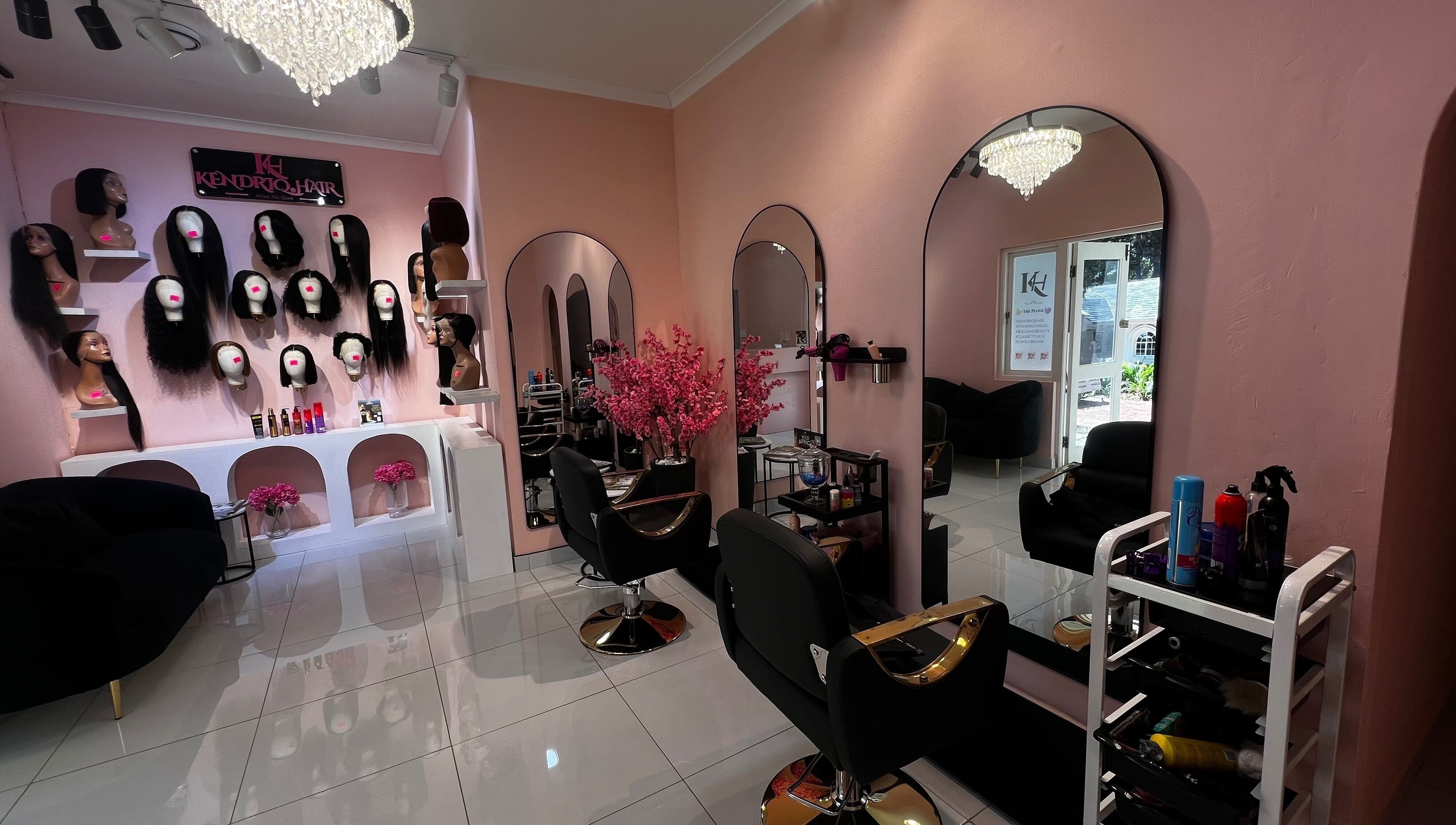 Elegant interior of KendriQ Hair Salon Fourways, featuring stylish decor and displays in Fourways, Sandton, Gauteng, ZA.