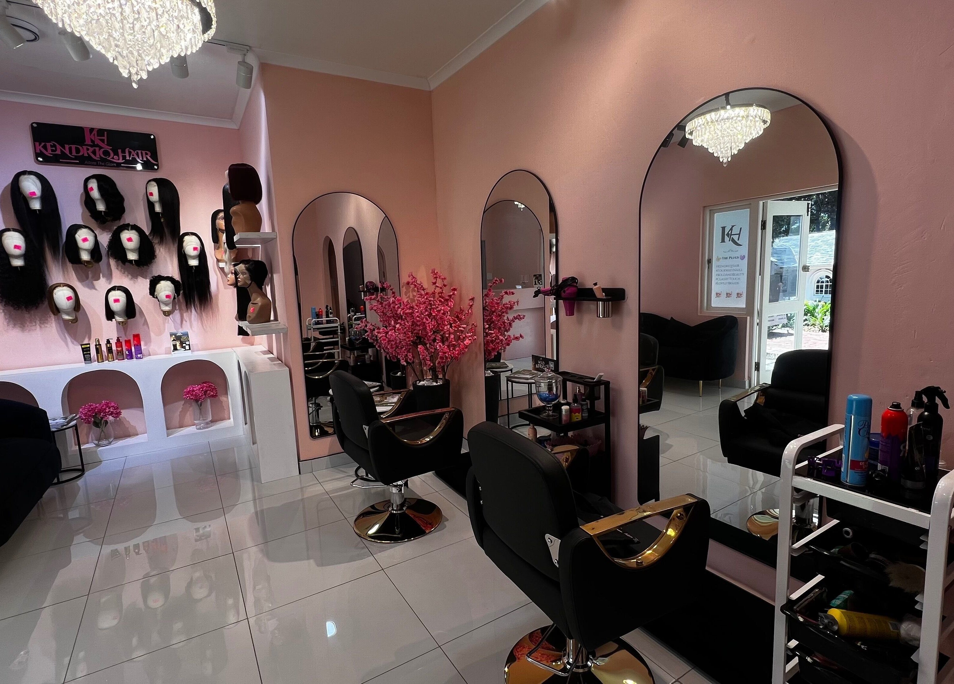 Elegant interior of KendriQ Hair Salon Fourways, featuring stylish decor and displays in Fourways, Sandton, Gauteng, ZA.