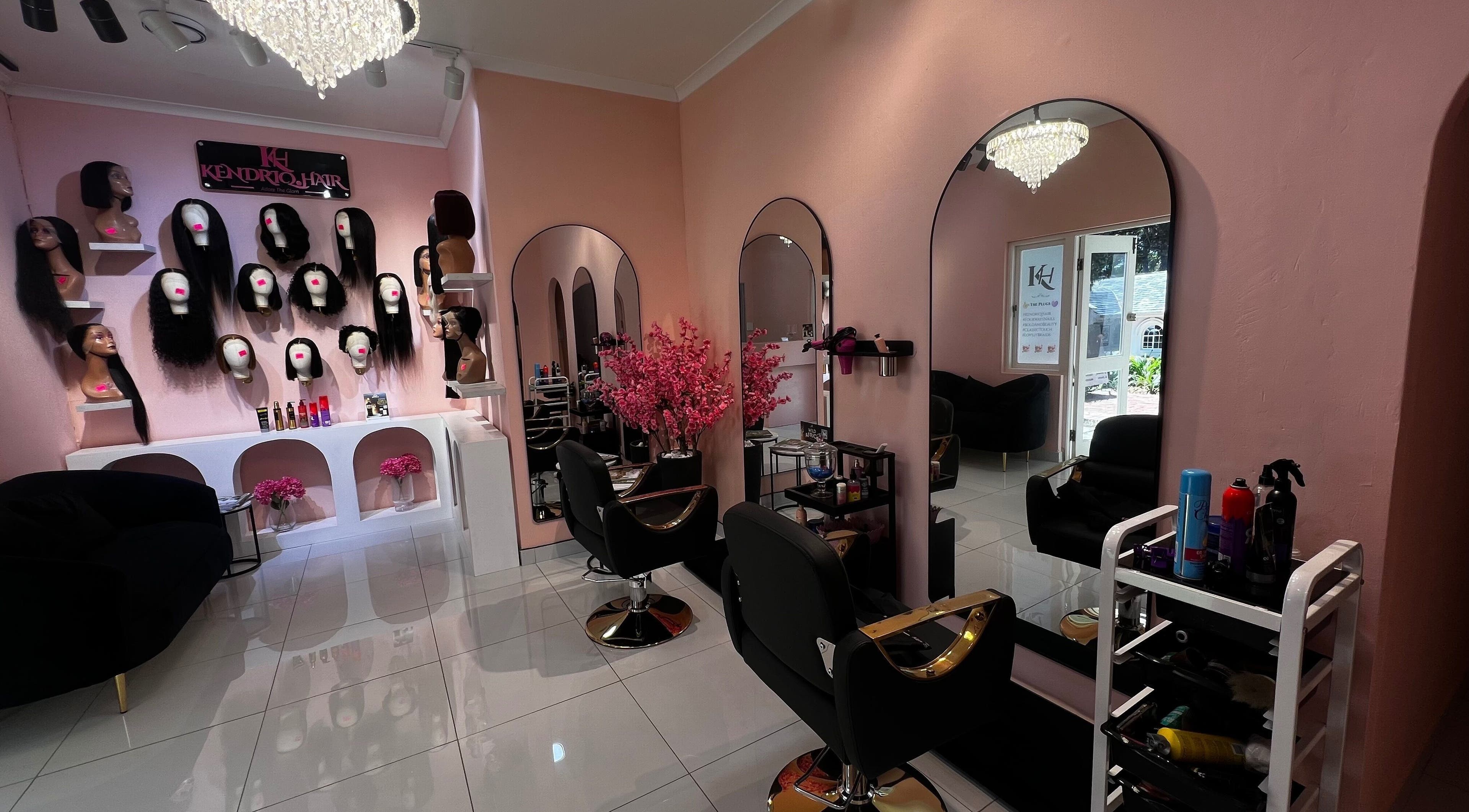 Elegant interior of KendriQ Hair Salon Fourways, featuring stylish decor and displays in Fourways, Sandton, Gauteng, ZA.