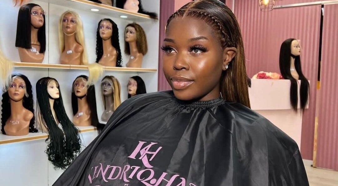 Client adorned with sleek style at KendriQ Hair Salon Fourways, Fourways, Sandton, Gauteng, ZA.