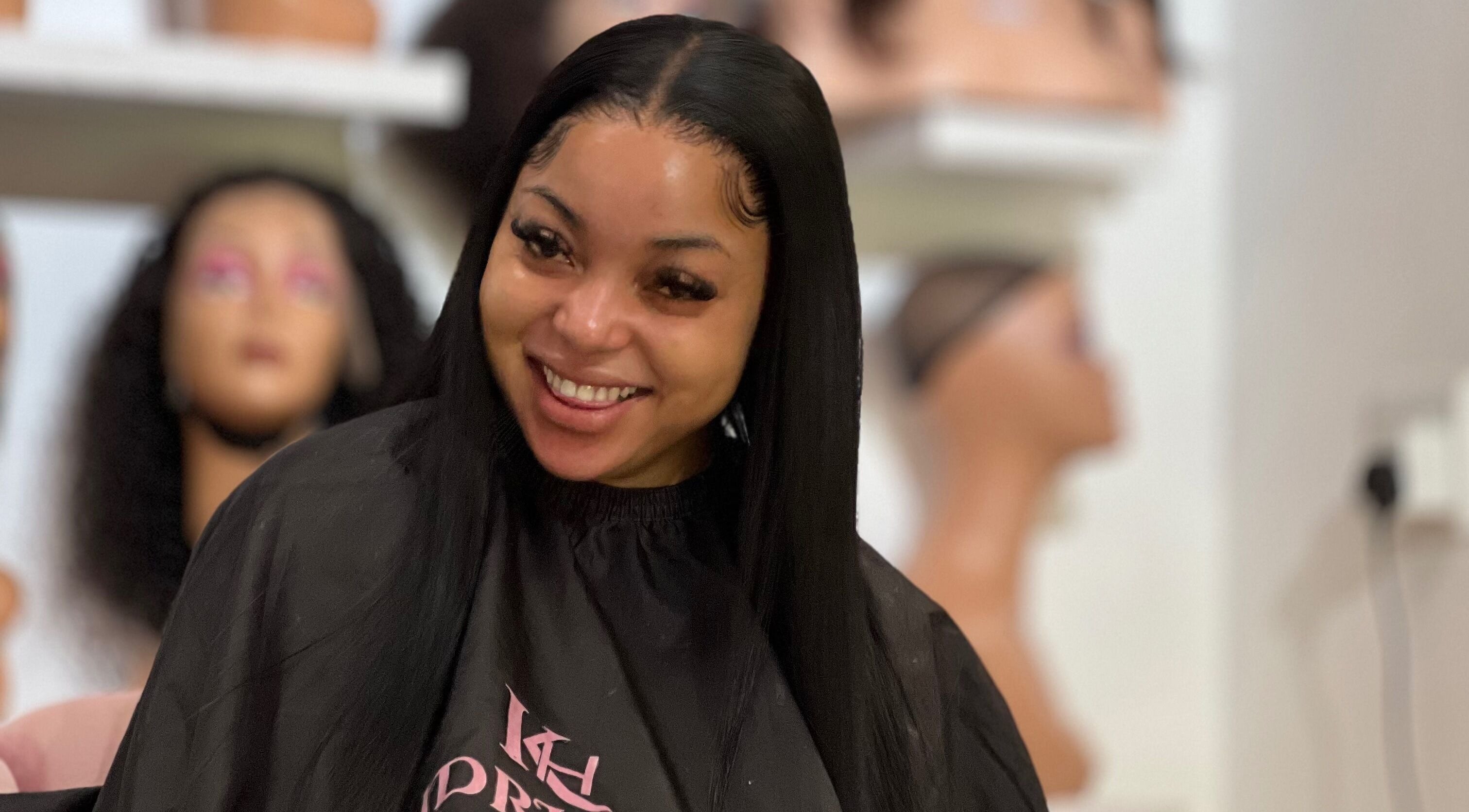 Happy client at KendriQ Hair Salon Fourways, located in Fourways, Sandton, Gauteng, ZA, showcasing beautiful hairstyle.