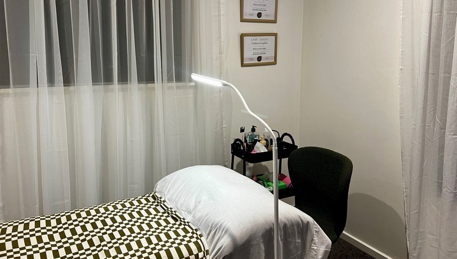 Treatment room at Beauty By Stella Love, Christchurch, Canterbury Region, NZ, featuring a cozy bed and ambient lighting.