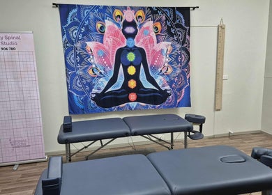 Synergy Spinal Flow Studio therapy room with chakra art, Mareeba, Queensland, AU.