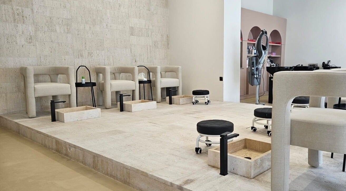 Luxurious pedicure area at Adore Beauty Ladies Salon in Sharjah, AE featuring plush chairs and foot baths.
