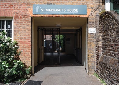 Entrance view of Big Calm Reflexology at St. Margaret's House, London, England, GB.