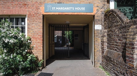 Entrance view of Big Calm Reflexology at St. Margaret's House, London, England, GB.