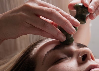 Relaxing stone massage at Big Calm Reflexology in London, England, GB, enhancing wellness and tranquility.