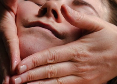 Relaxing facial massage at Big Calm Reflexology, London, England, GB, enhancing wellbeing and relaxation.