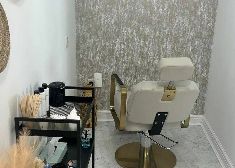 Elegant styling chair and accessories at Touch of Beauty, Cross Hands, Wales, GB, exuding modern luxury.