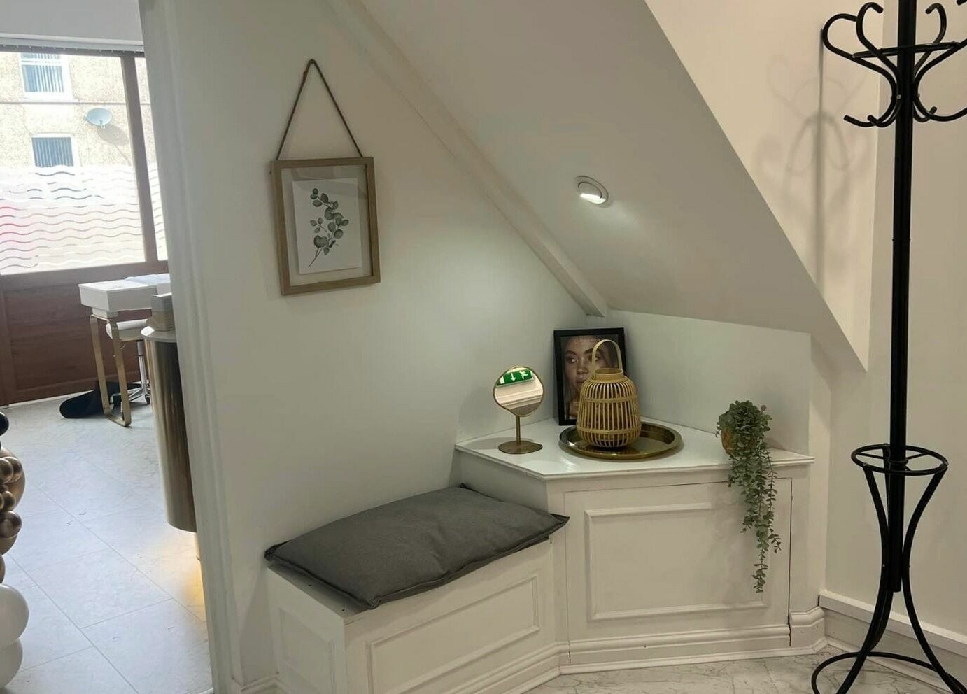 Cozy corner nook at Touch of Beauty in Cross Hands, Wales, GB, featuring elegant decor and comfortable seating.
