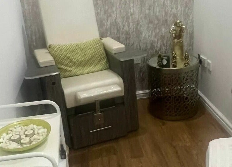 Serene spa chair and decor at Touch of Beauty, Cross Hands, Wales, GB offering a calming ambiance.