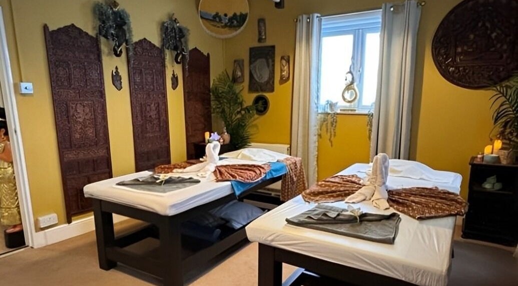Relaxing massage room at Sukhothai Thai Massage & Spa, Milton Keynes, England, GB with elegant decor and soothing ambiance.