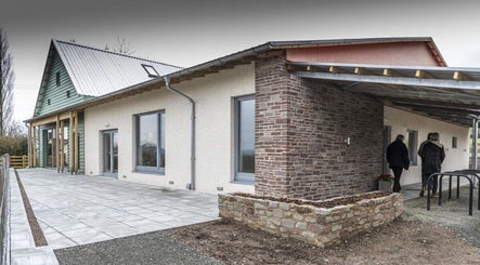 Exterior of Sharon Evans soft tissue therapy in Hereford, GB showing modern architecture.