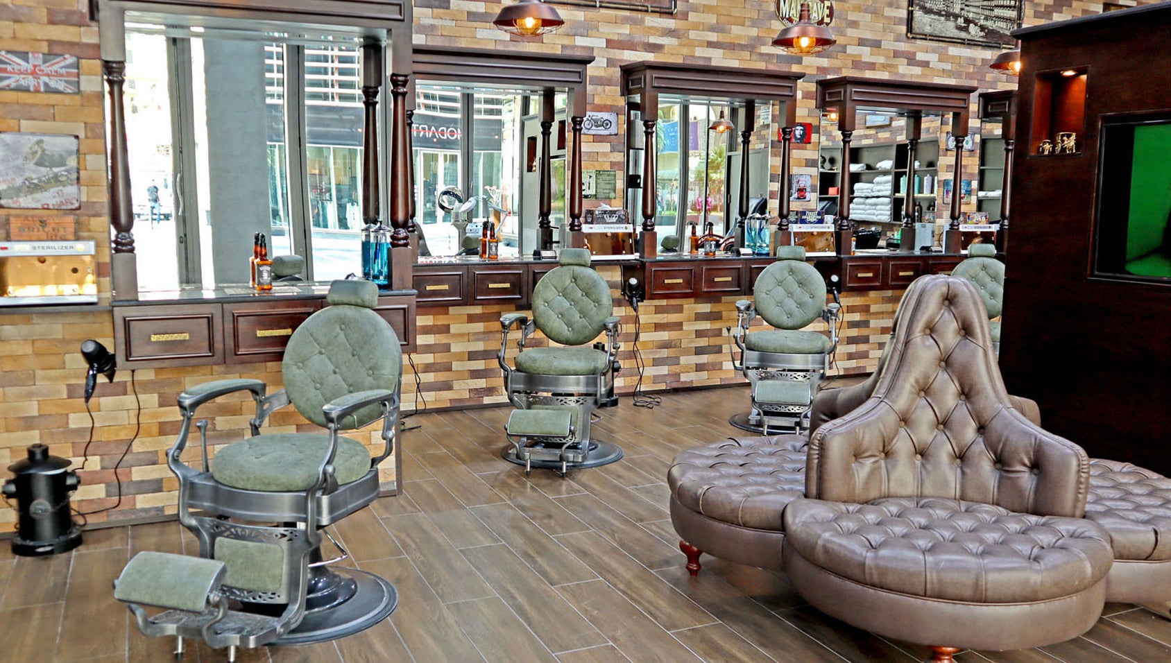 Elegant interior of Fade & Shave Barbers The Beach, JBR in Dubai, AE, featuring vintage barber chairs.