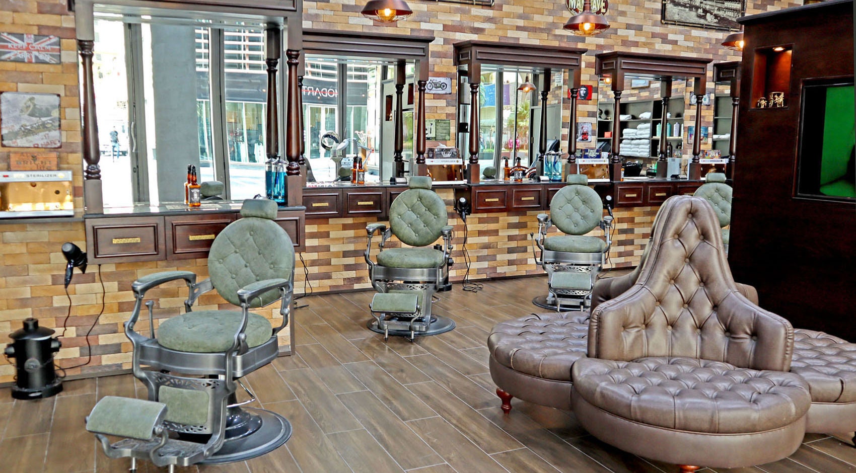 Elegant interior of Fade & Shave Barbers The Beach, JBR in Dubai, AE, featuring vintage barber chairs.