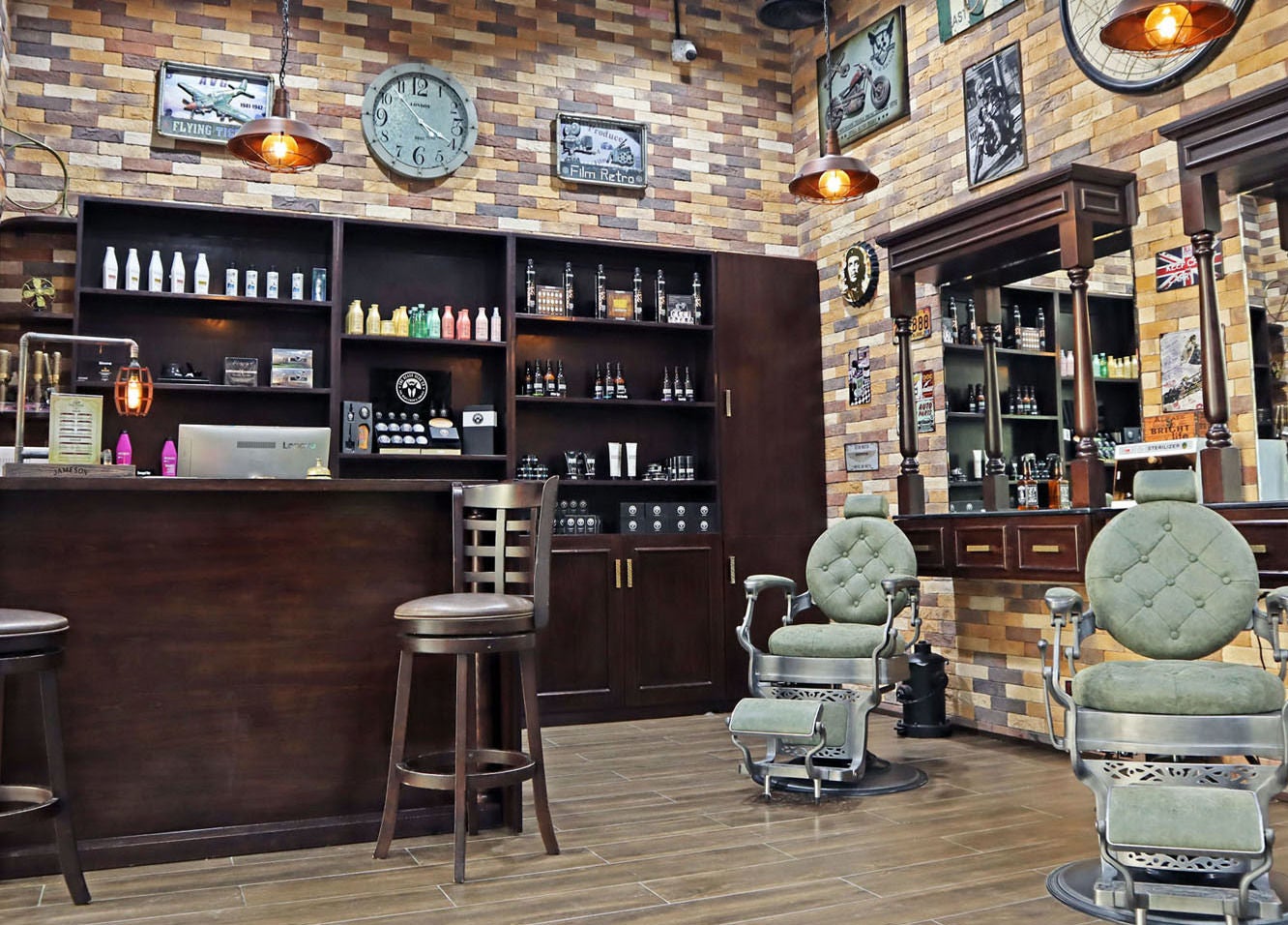 Barbershop interior at Fade & Shave Barbers The Beach, JBR in Dubai, AE with vintage decor and styling chairs.