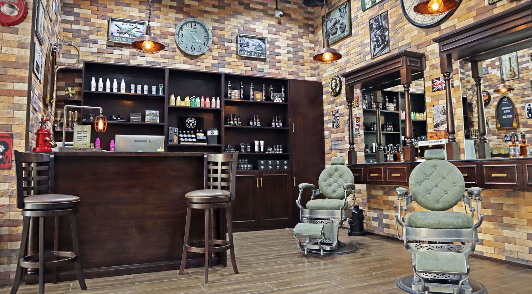 Barbershop interior at Fade & Shave Barbers The Beach, JBR in Dubai, AE with vintage decor and styling chairs.