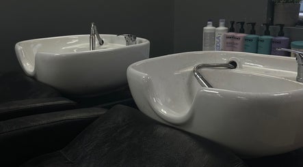 Elegant washbowls at Bella Vida Hair, Ormskirk, England, GB, offering a luxurious hair care experience.