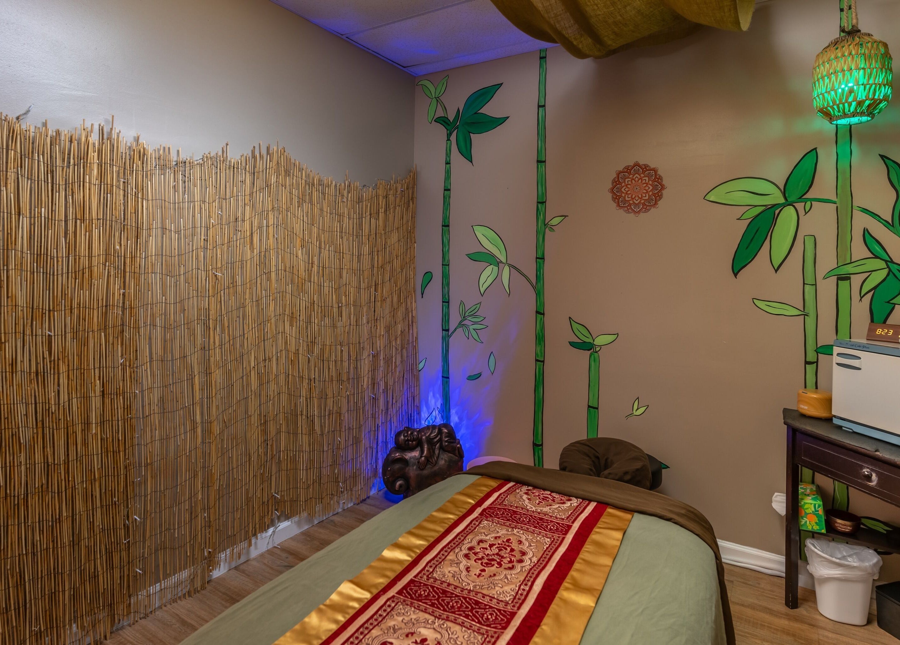 Tranquil bamboo-themed spa room at Healing Hippie, Hampstead, North Carolina, US.