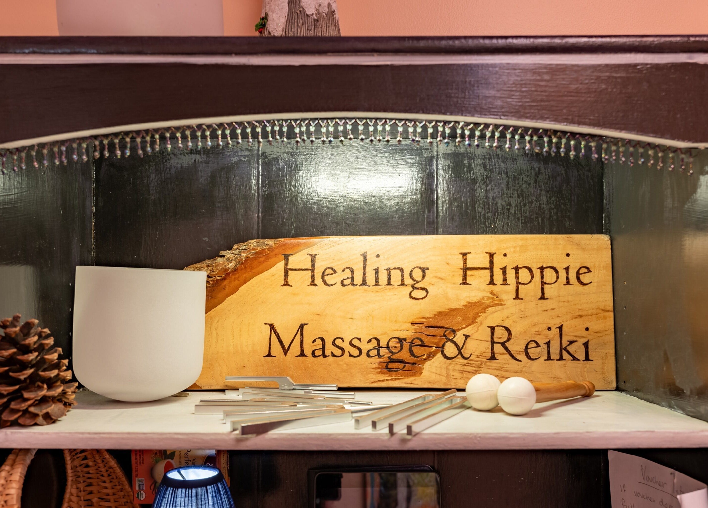 Healing Hippie massage and Reiki sign with decor in Hampstead, North Carolina, US.