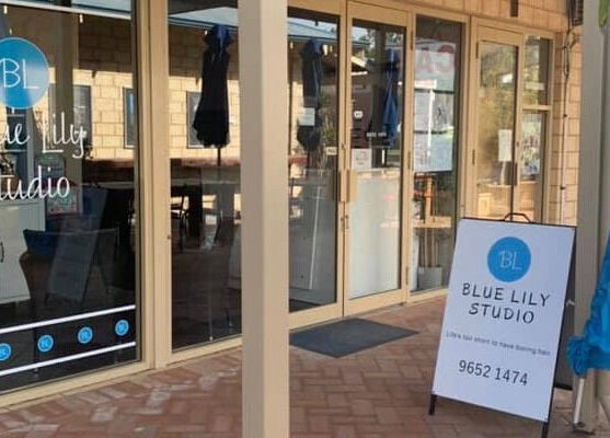 Entrance of Blue Lily Studio in Jurien Bay, Western Australia, showcasing the exterior sign and glass facade.