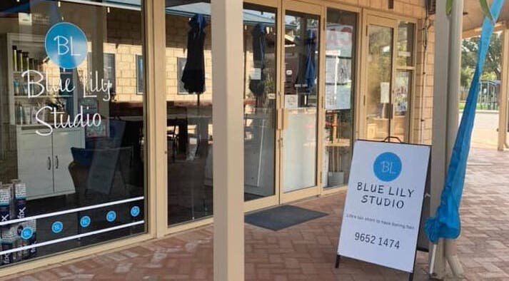Entrance of Blue Lily Studio in Jurien Bay, Western Australia, showcasing the exterior sign and glass facade.