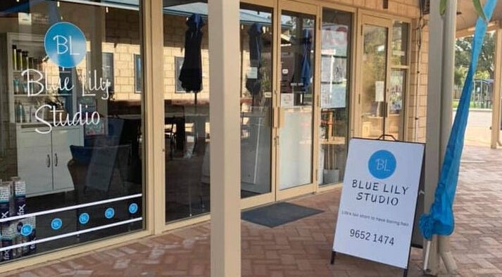 Entrance of Blue Lily Studio in Jurien Bay, Western Australia, showcasing the exterior sign and glass facade.